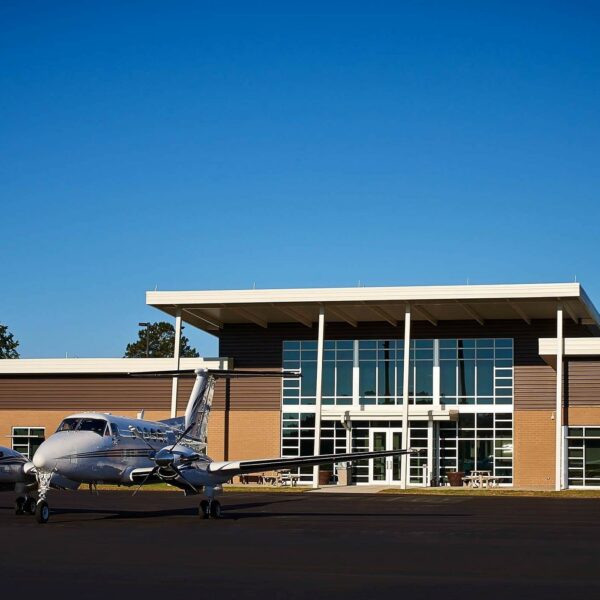 plane outside on tarmac at new JNX terminal building