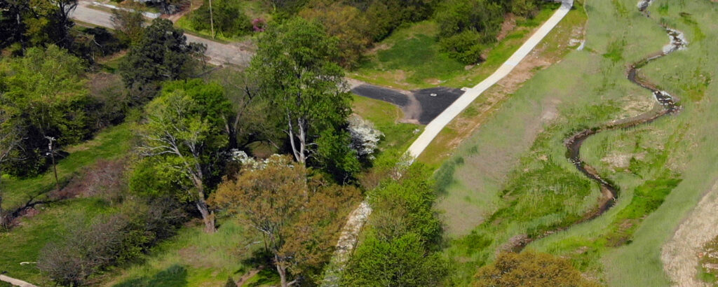 Aerial view of walking trail and creek at Butterfly Ranch Trail