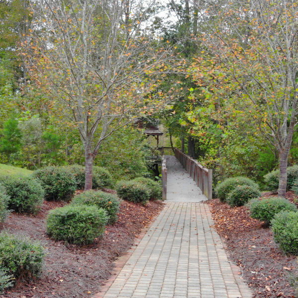 Millbridge Subdivision sidewalk image with wooden bridge