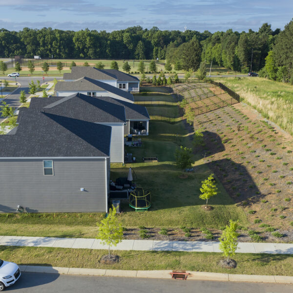 Stoneybrook Subdivision aerial image of houses and backyards