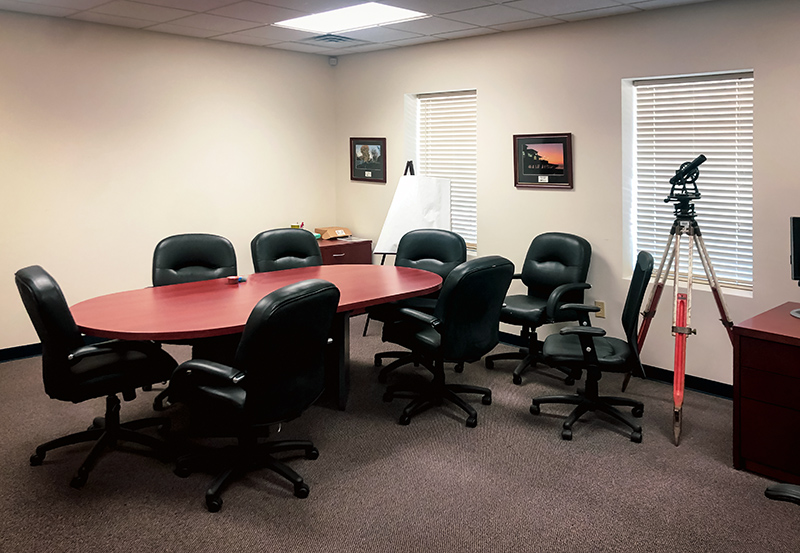 Conference room with chairs around a table